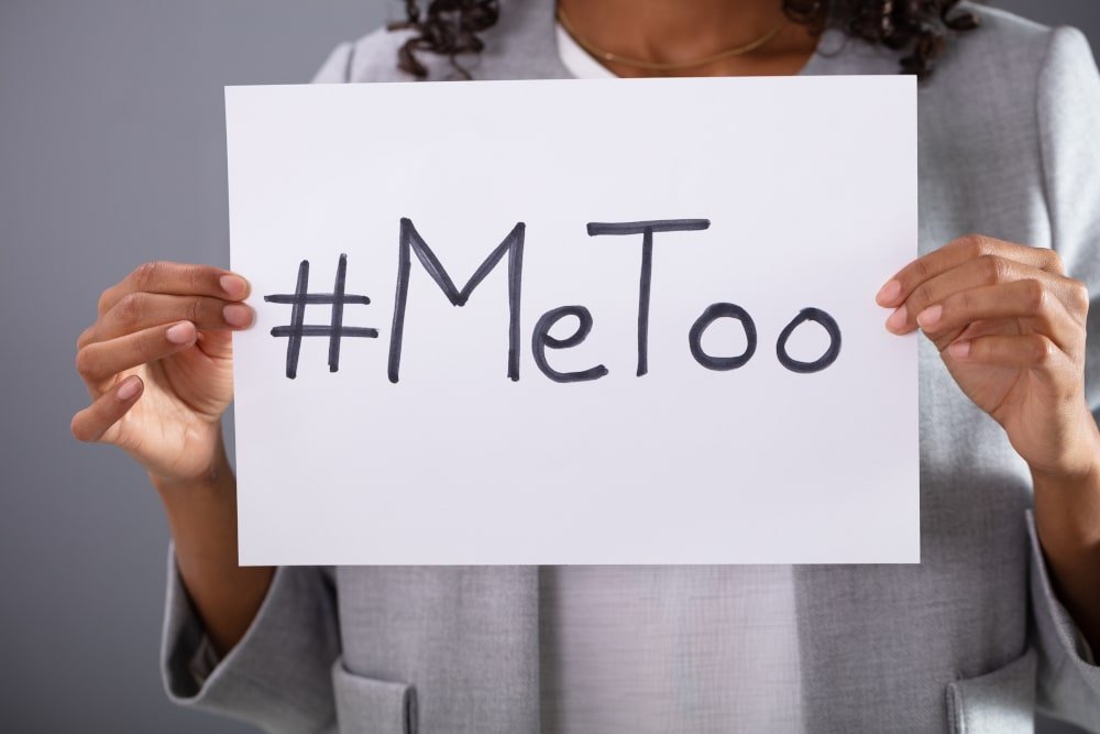 woman-holding-metoo-hashtag